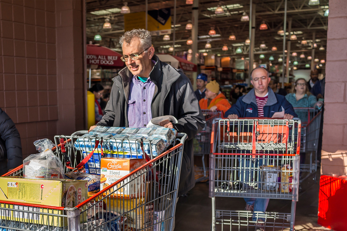 people leaving a supermarket