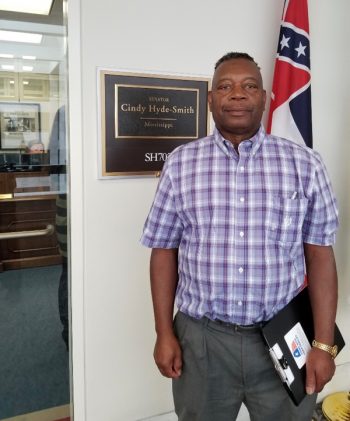 Carlton Sanders outside the office of Rep. Cindy Hyde-Smith (R-Miss.). (Photo credit: RAFI-USA)