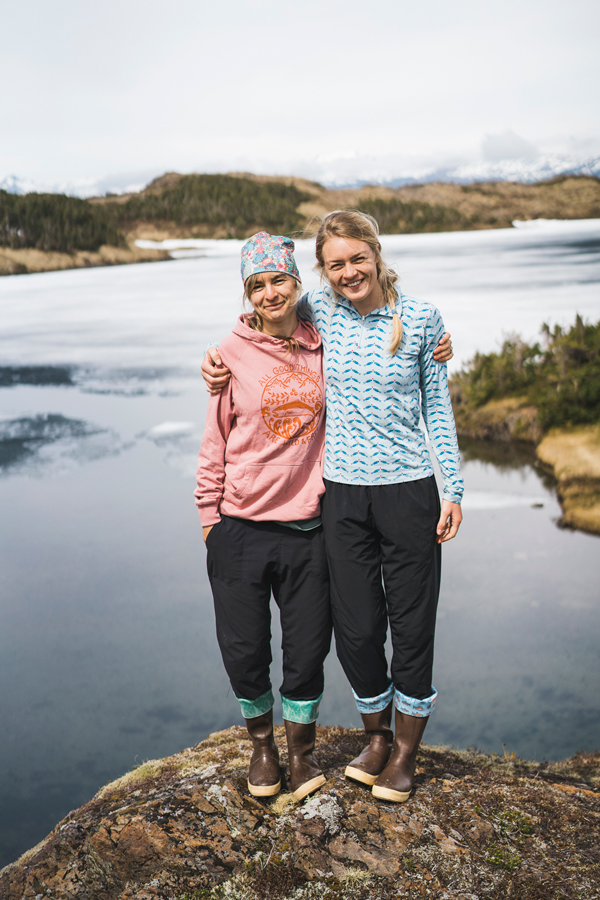 Salmon Sisters Claire Neaton and Emma Privat on the shore.