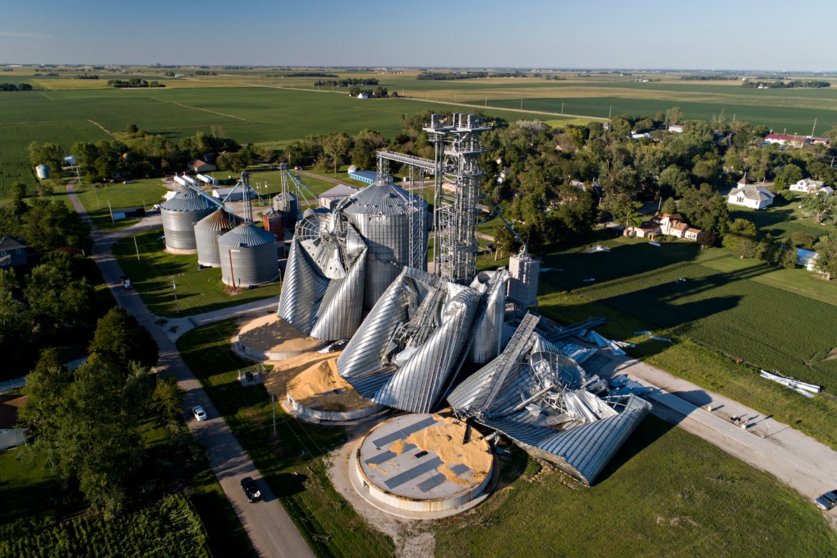 Grain bins damaged by the derecho storm in are shown at the Heartland Co-Op grain elevator on August 11, 2020 in Luther, Iowa.