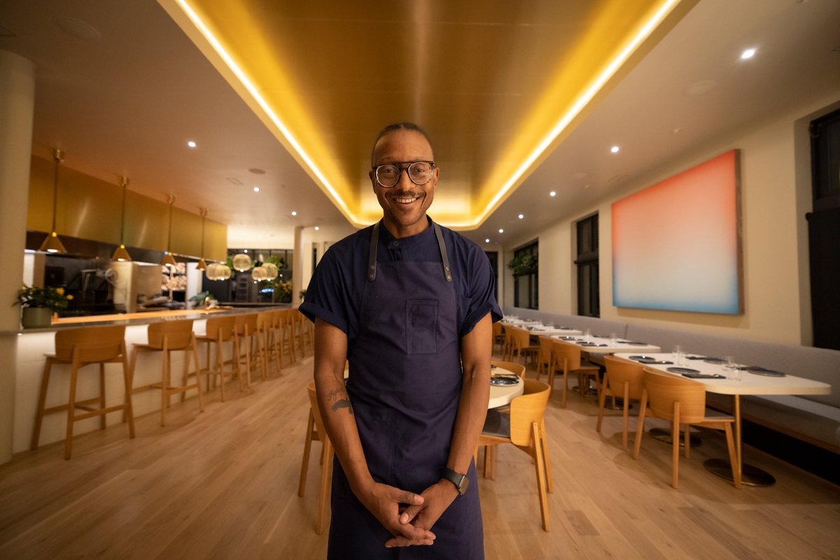 Gregory Gourdet in the dining room of his new Haitan restaurant Kann, which opened in August. (Photo credit: Zack Lewis)